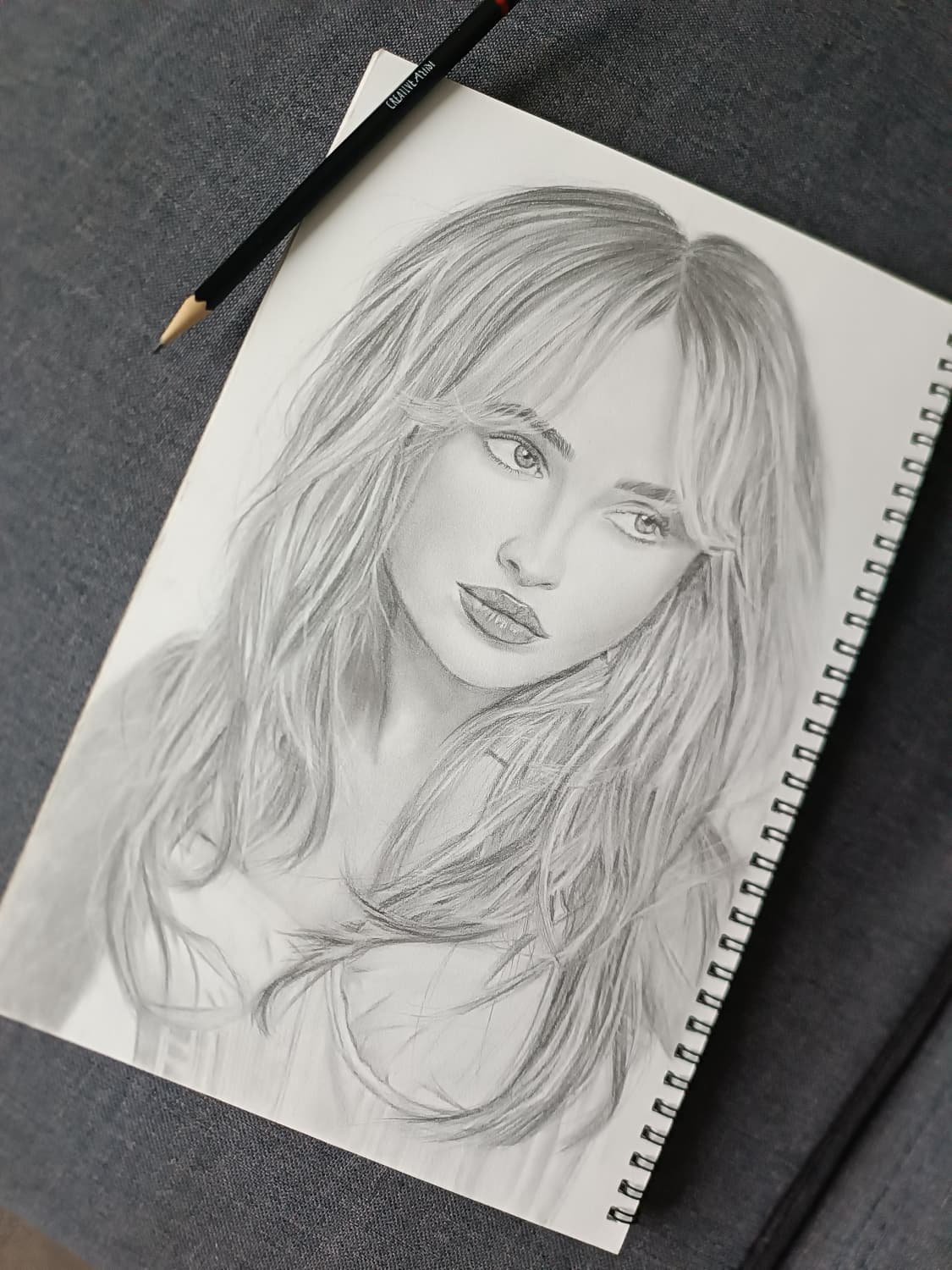 Portrait of Sabrina Carpenter, graphite on white paper