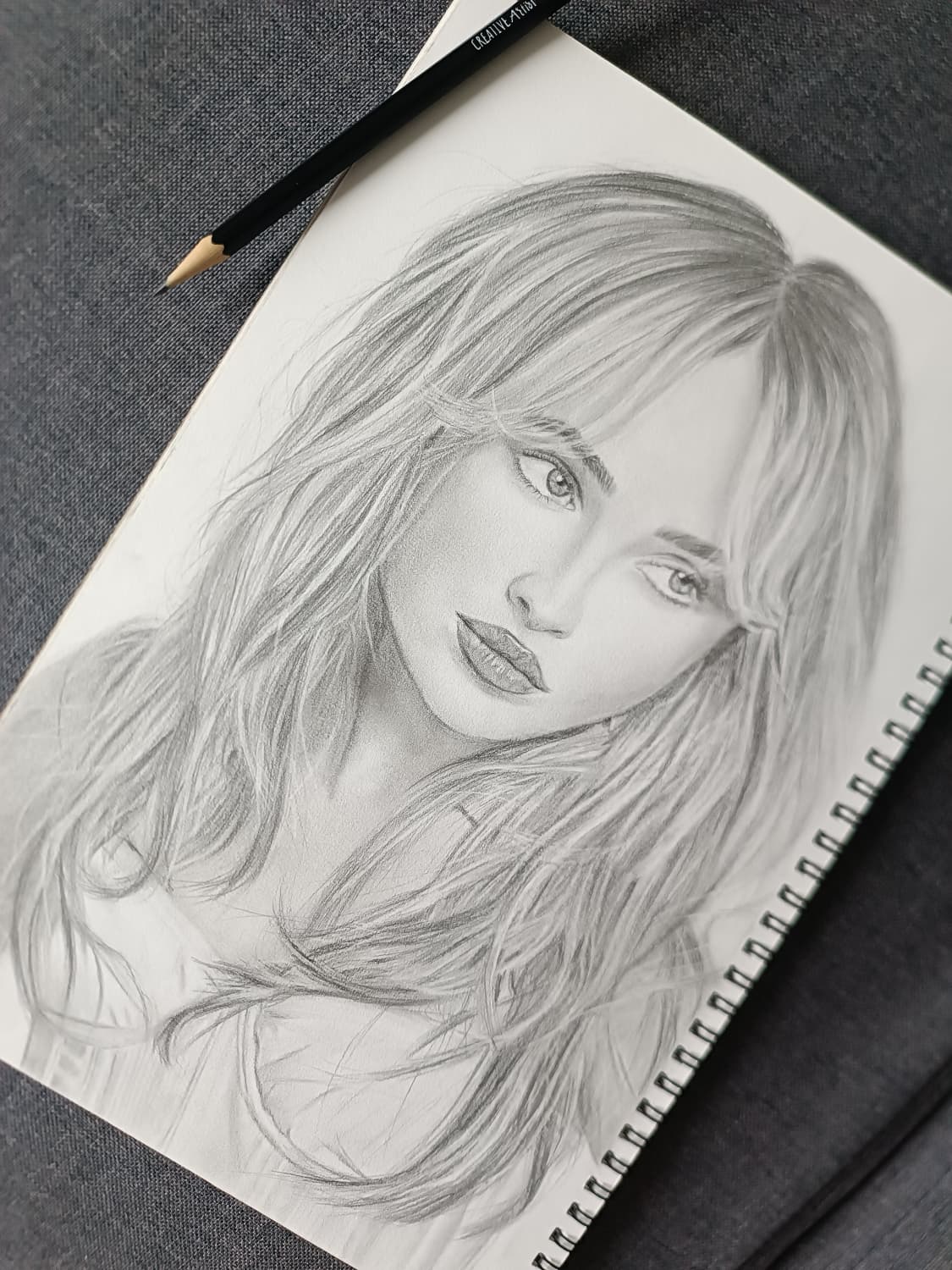 Portrait of Sabrina Carpenter, graphite on white paper